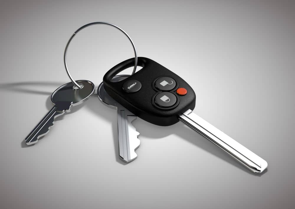 modern-car-keys-for-passenger-vehicle-isolated-on-flat-white